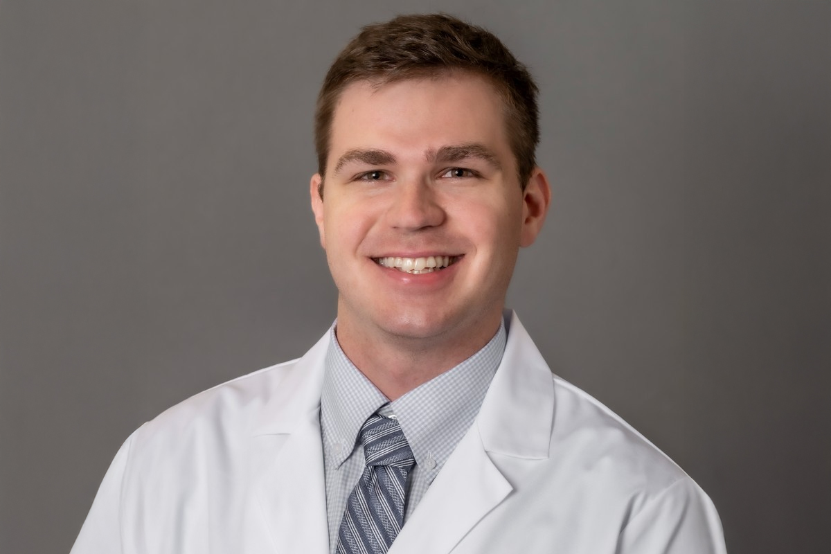 Christian Boudreaux PA C photo Christian Boudreaux PA C photo of man in white coat