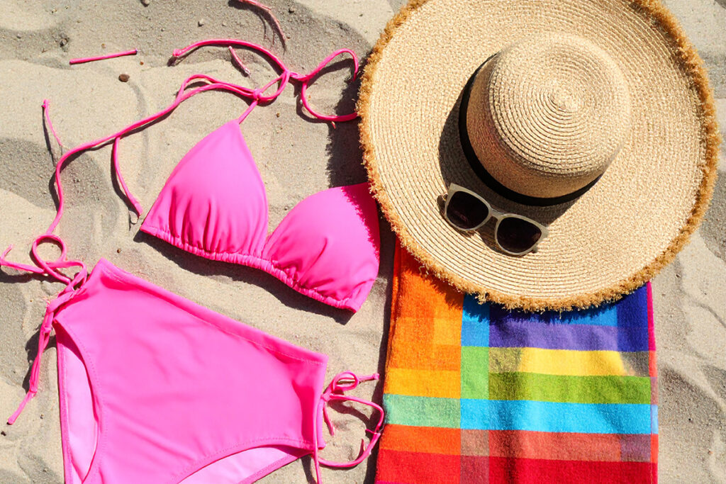 Hot pink swimsuit and hat