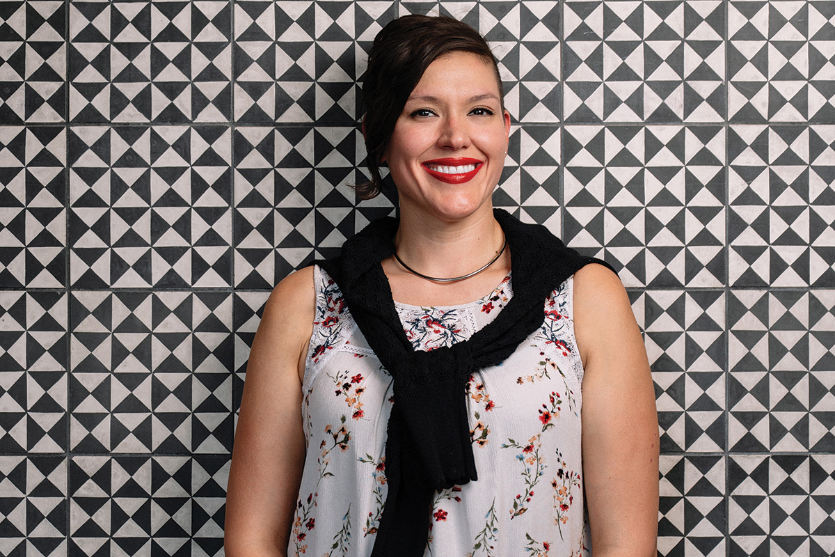 Role Model Michelle Raza Michelle Raza, brunette woman in front of black and white background