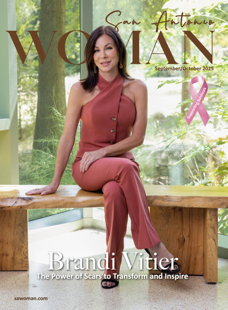 Woman sitting on bench in front of windows