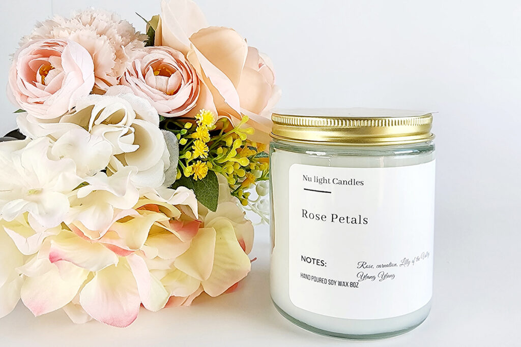 White candle with roses