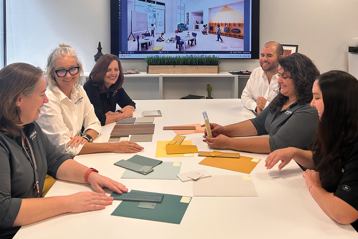 YWCA employees working at a table